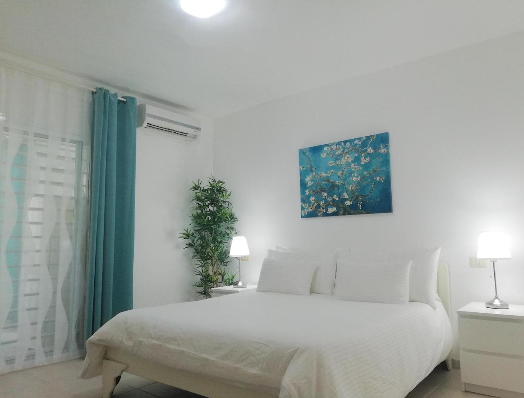 Condo With Garden View And Beach